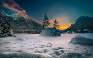 Snowy mountain landscape sunset city - a red sky free wallpaper