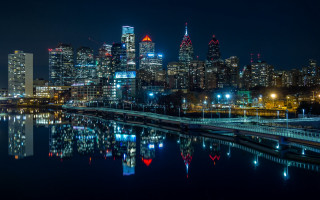 City skyline night bridge river 15 - a bridge in the foreground free wallpaper