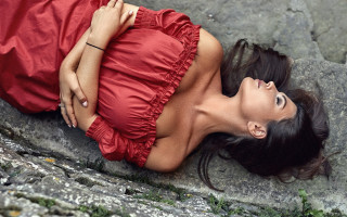 Red dress laying rock portrait - annabel eyres free wallpaper for desktop