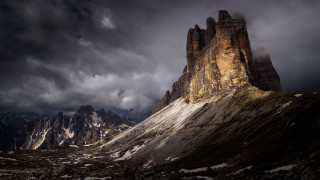 Mountain rock formation cloudy sunset - a few cloud above free wallpaper