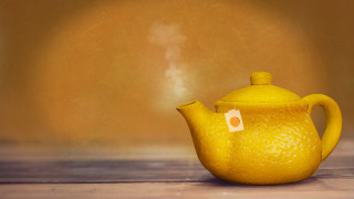 Yellow teapot tag table wall - a tag free wallpaper