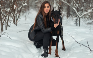 Woman kneeling snow dog forest - free dogs wallpaper