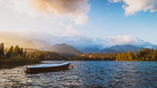Mountain lake boat nature sky - lake free wallpaper