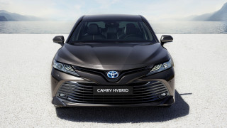 Black car beach ocean mountains - a black car free wallpaper