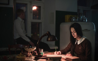 Woman sitting desk book lamp - a pen free wallpaper for desktop