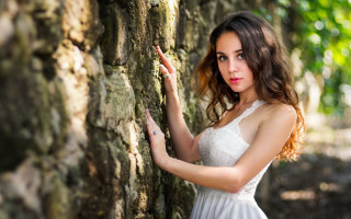 Woman white dress leaning wall 11 - leaning free wallpaper