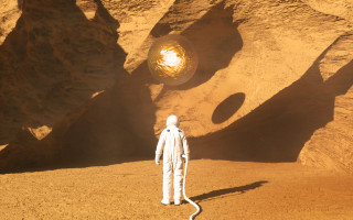 Space suit man yellow light - a rock formation free wallpaper