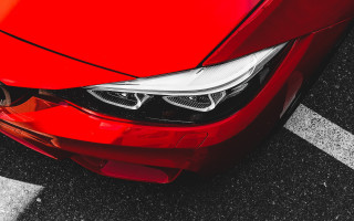 Red car dented bumper aurora - a white stripe free wallpaper