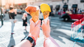 Food cones street corner bokeh - the background and a person holding free wallpaper