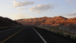 Mountain road sunset clouds horizon - the road free wallpaper