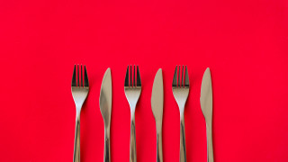 Forks knives red background food - a red background behind them free wallpaper