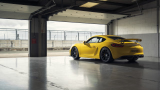 Yellow sports car garage puzzle - side profile free wallpaper