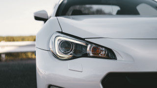 White sports car headlight road - neoism free wallpaper