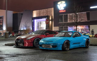 Night parking lot building lit - vibrant color free wallpaper