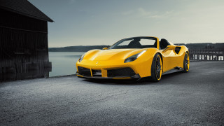 Yellow sports car road water - a road next free wallpaper