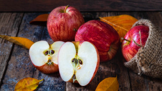 Apples wooden table leaves cloth - a wooden table next free wallpaper
