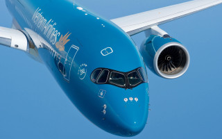 Large blue airplane flying jetengine - a jet engine free wallpaper