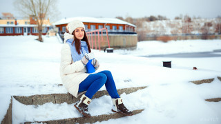 Woman sitting snow coat beanie - a cup of coffee free wallpaper for desktop
