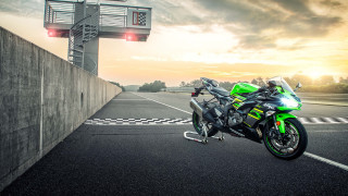 Green motorcycle sunset road wall - a green motorcycle free wallpaper