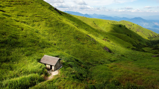 Small house grassy hill mountains 2 - the background and a path free wallpaper