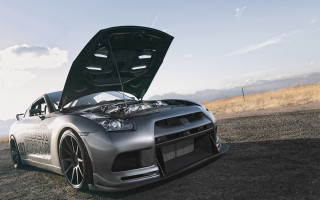 Car mountain dirt road clouds - its hood free wallpaper