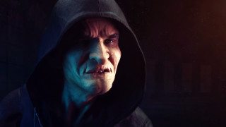 Creepy man hooded jacket glowing - ultra realistic face free wallpaper