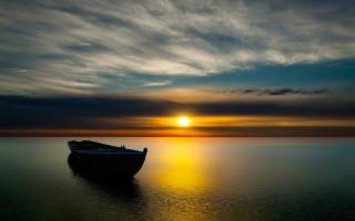 Boat sunset mountain ocean clouds - the distance behind free wallpaper