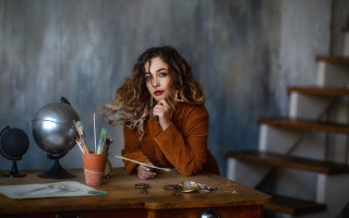 Woman desk globe pen portrait - studio portrait free wallpaper