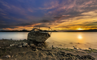 Boat beach ocean sunset clouds - a sky free wallpaper