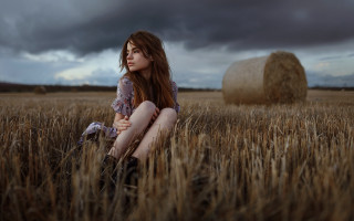 Woman field wheat bale cloudy - christabel dennison free wallpaper