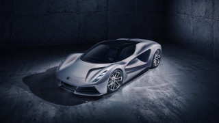 Silver sports car dark room 38 - a concrete wall behind free wallpaper