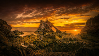 Rocky beach sunset formation water - a rocky beach free wallpaper