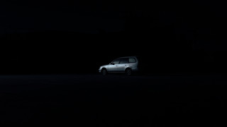 White car night parking headlights - dramatic cinematic lighting free wallpaper