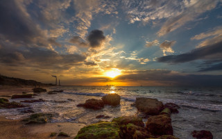 Sunset ocean rocks lighthouse cloudy - bracha l. ettinger free wallpaper