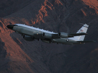 Military plane flying mountains sunset - pathfinder free wallpaper