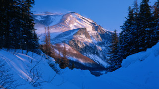 Snowy mountain forest lake blue - a blue sky above free wallpaper for desktop