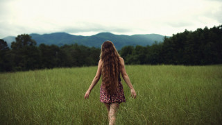 Woman field mountains longhair nature - a long hair free wallpaper