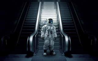 Man spacesuit escalator dark room - imax free wallpaper