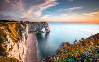 Cliff beach water sunset arch - a cliff free wallpaper