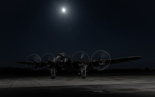 Night moon plane atmospheric portrait - the moon in the background free wallpaper