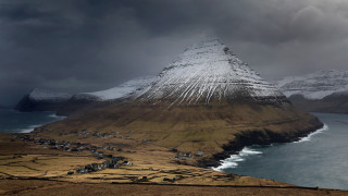 Mountain snow capped village coast - a village free wallpaper