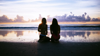 Beach sunset two women horizon - the sunset free wallpaper