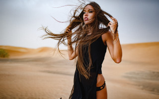 Desert woman blackdress wind blown - the desert free wallpaper