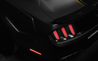 Black sports car red tail - a yellow stripe free wallpaper