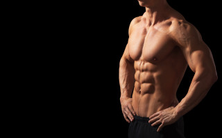 Muscular man topless venous posing - a muscular body free wallpaper