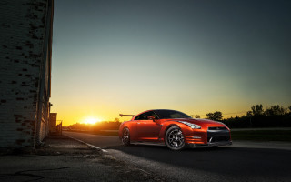 Red sports car sunset road 3 - the sun setting behind free wallpaper for desktop