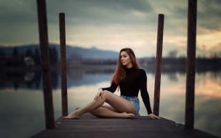 Woman dock sitting water cloudy - a dock free wallpaper