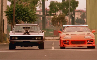 Two cars driving street palm - free cars wallpaper