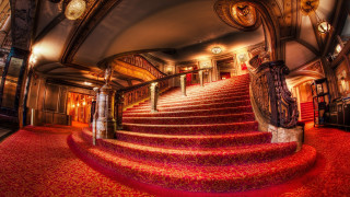 Red carpeted staircase large room - theatrical free wallpaper for desktop