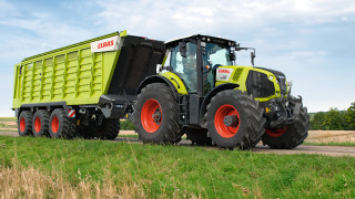 Tractor field sunny blue sky - a road next free wallpaper